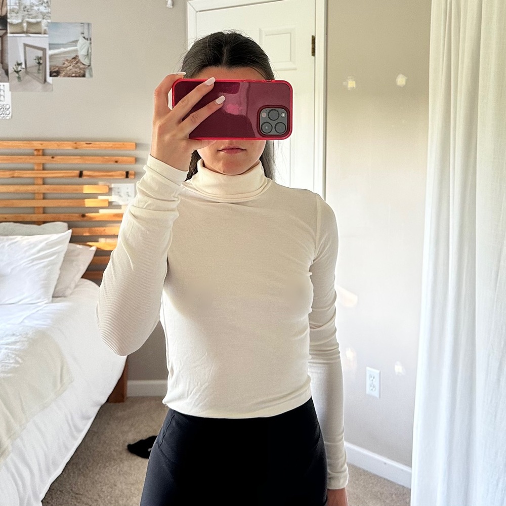 Cream colored turtle neck